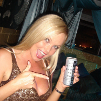 Blonde MILF Silvia Saint fully clothed posing flaunting big tits at party