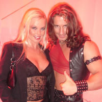 Blonde MILF Silvia Saint fully clothed posing flaunting big tits at party