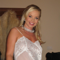 Ravishing blonde starlet Silvia Saint poses sensually in sexy clothes