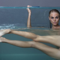 Blonde teen Nancy A masturbates under water in Aquarium