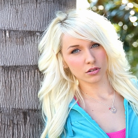 Blonde teen babe Stevie Shae uncovering her fuckable body