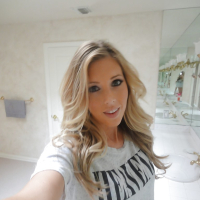 Young blonde Samantha Saint taking nude selfies in the bathroom