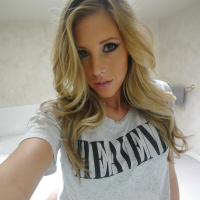 Young blonde Samantha Saint taking nude selfies in the bathroom