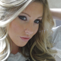 Young blonde Samantha Saint taking nude selfies in the bathroom