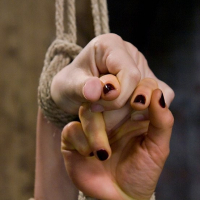 Subgirls Lorelei Lee and Annette Schwarz bound together with toy