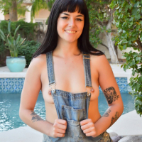 Shameless young coed Nova Vixen spreads trimmed pussy in backyard