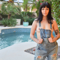 Shameless young coed Nova Vixen spreads trimmed pussy in backyard