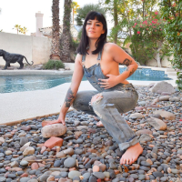 Shameless young coed Nova Vixen spreads trimmed pussy in backyard