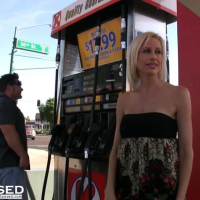 Blonde babe Kylie Worthy puts on a sexy tease while pumping gas and shows off