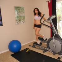 Big titty babe Mai Ly slowly strips naked during her workout at the gym
