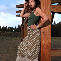 Sweet girl Elena Generi flashing her small boobs outdoors