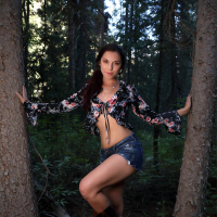 Elena Generi shows her hairy pussy in the forest