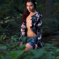 Elena Generi shows her hairy pussy in the forest