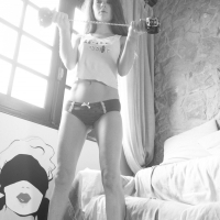 Mia Sollis rubs her Cunt in black and white Photos