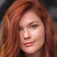 Redhead Babe Mia Sollis naked with her Legs open