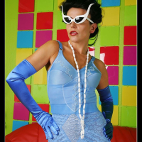 Model Eve posing in blue fifties lingerie