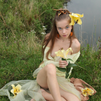 Young teen Milena D naked outdoors showing perky small tits hairy muff