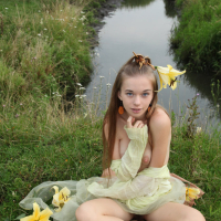Young teen Milena D naked outdoors showing perky small tits hairy muff