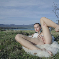 Milena D spreads her pink pussy for you on the beautiful landscape