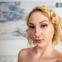 Busty blonde Skylar Vox sucks and tit fucks big dick before getting laid