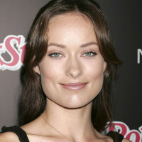 Olivia Wilde exposing her nice tits in see thru and posing very sexy