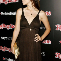 Olivia Wilde exposing her nice tits in see thru and posing very sexy