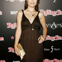 Olivia Wilde exposing her nice tits in see thru and posing very sexy