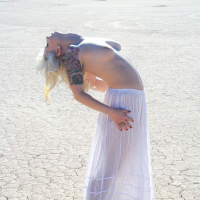 Pictures of Lynn Pops showing her tits and pussy outside