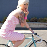 Pictures of Lynn Pops showing her boobs outside