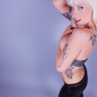Pictures of Lynn Pops stripping for your pleasure