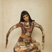 Exotic Babe Masuimi Max playing with a big Snake