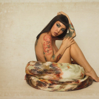 Exotic Babe Masuimi Max playing with a big Snake
