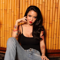 Masuimi Max posing topless in some sexy tight Jeans