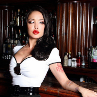 Masuimi Max at the Bar in Stockings and Suspenders