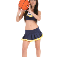Brunette cheerleader showing her bald pussy