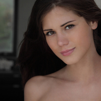 Little Caprice posing nude in bed