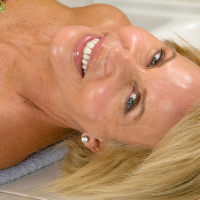Close up session of a mature babe Erica Lauren spreading her legs