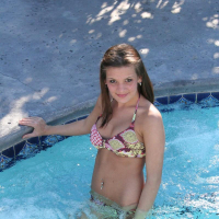 Busty teen girl Katie gets wet just for you