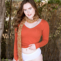 Hot River Fox reveals her naked tits outdoors