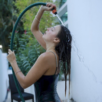 Hot Melena Maria Rya gets wet while posing in the backyard