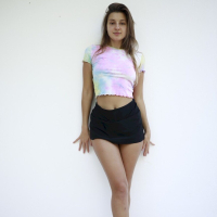 Melena Maria Rya lifts up her shirt to show her nice small boobs