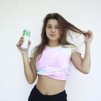 Melena Maria Rya lifts up her shirt to show her nice small boobs