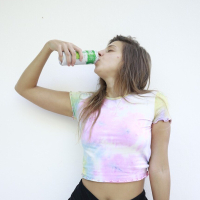 Melena Maria Rya lifts up her shirt to show her nice small boobs