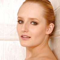 Frolic blonde babe Denisa Heaven playing with her sex toy in the shower