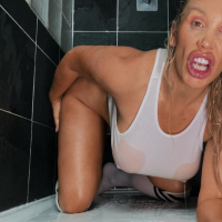 Rebecca More stuffs her twat with a huge dildo