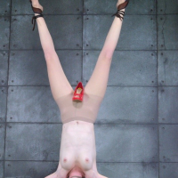 Ashley Lane and Bonnie Day both bound in a kinky dungeon