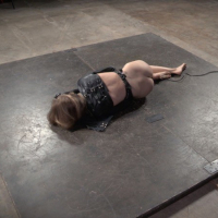 Ashley Lane bound in leather with mask gets pussy toyed and stra