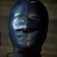 Ashley Lane redhead bound in dungeon with leather and dribbling