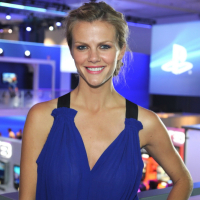 Brooklyn Decker showing big cleavage in blue mini dress at PlayStation booth at