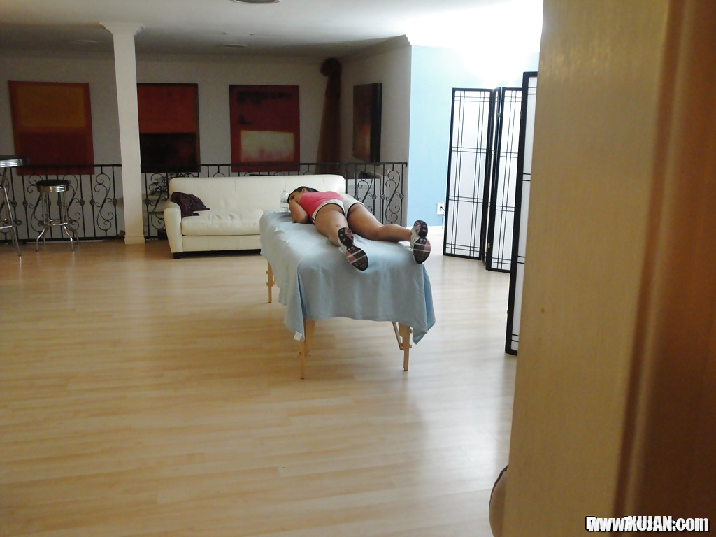 Busty MILF Isis Love getting naked on massage table before masseuse arrives - Photo #1475244